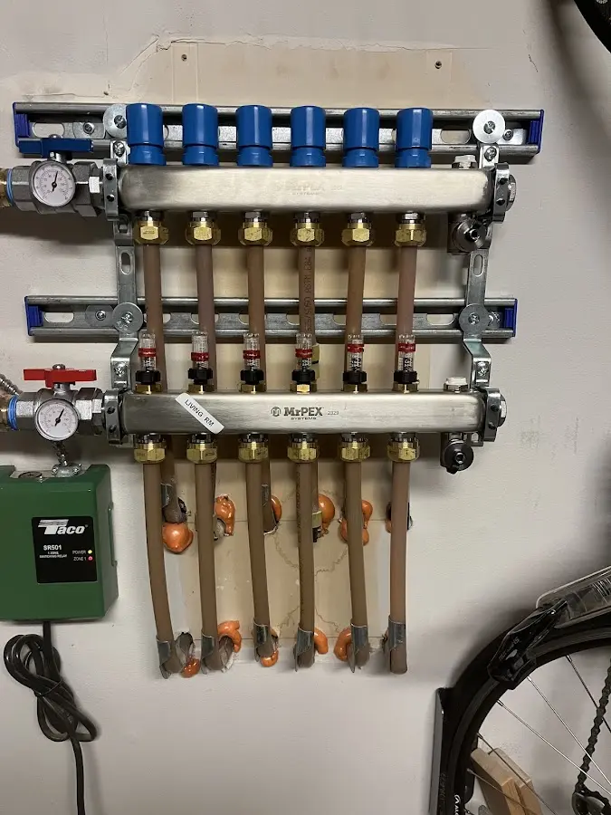 Plumber performing Leak Detection at a residential property in Walton